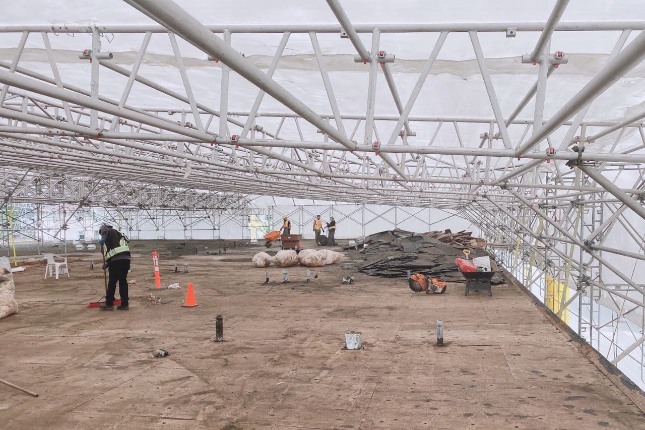 Four workers at a jobsite