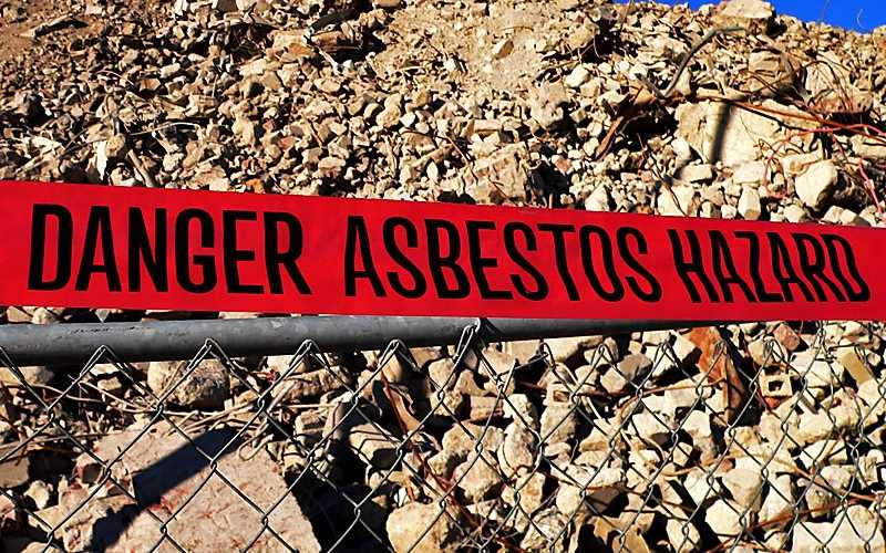 Asbestos hazard sign at a jobsite