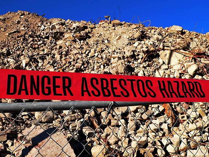 Asbestos hazard sign at a jobsite